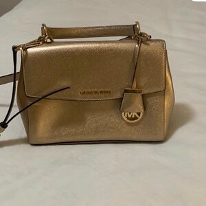 Michael Kors Purse. Gold color